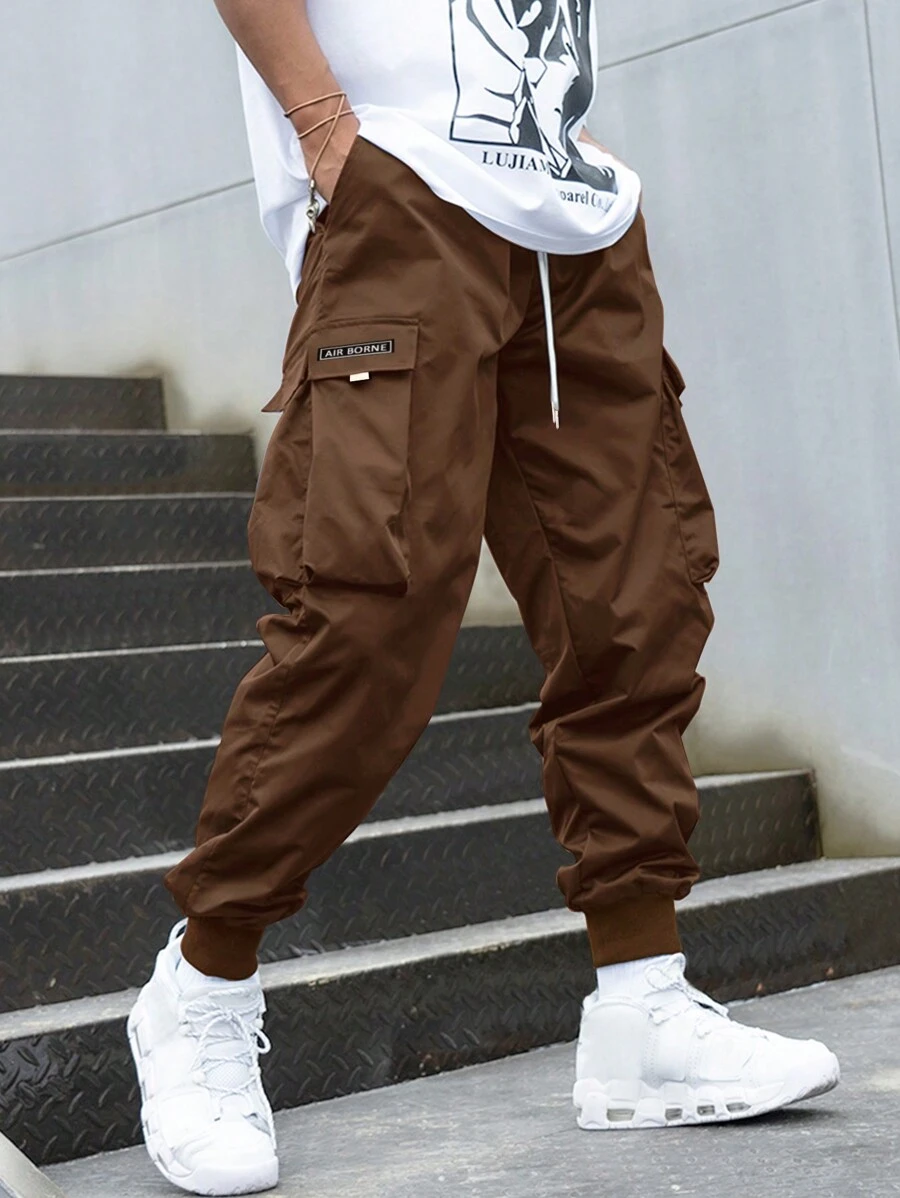 Manfinity EMRG 1pc Men Loose Letter Graphic Flap Pocket Drawstring Waist Cargo Pants - Rust Brown - View 1