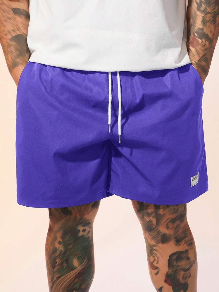 EASEVO Men Plus Size Solid Color Drawstring Waist Slant Pocket