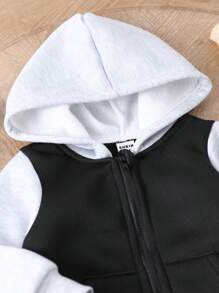 SHEIN This 2-Piece Set Includes A Hooded Zip-Up Sweatshirt Jacket And Solid Color, Adjustable Waist Pants, Providing Warmth And Comfort For Baby Boys During The Spring And Autumn Seasons. The Set Is Suitable For Both Outdoor Wear And Indoor Wear, And Can Be Paired With Various Outfits For Different Occasions. This Versatile And Durable Set Allows Baby Boys To Stay Stylish And Comfortable Throughout The Transitional Seasons.