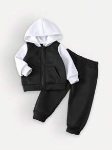SHEIN This 2-Piece Set Includes A Hooded Zip-Up Sweatshirt Jacket And Solid Color, Adjustable Waist Pants, Providing Warmth And Comfort For Baby Boys During The Spring And Autumn Seasons. The Set Is Suitable For Both Outdoor Wear And Indoor Wear, And Can Be Paired With Various Outfits For Different Occasions. This Versatile And Durable Set Allows Baby Boys To Stay Stylish And Comfortable Throughout The Transitional Seasons.