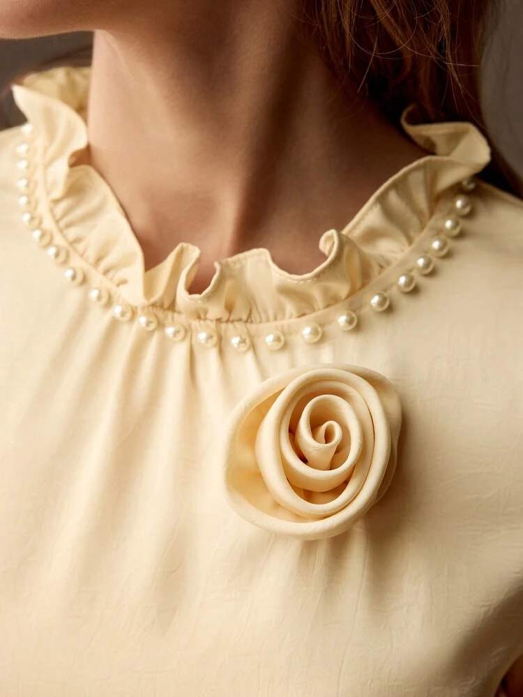 FRILL MOCK NECK STEREO FLOWER DETAIL FLARE SLEEVE BLOUSE