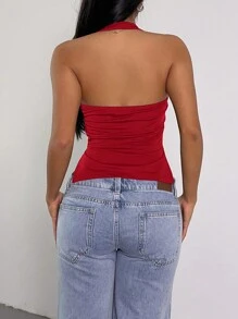 SHEIN SXY Top casual negro sin mangas con abertura en el dobladillo y cuello de halter
