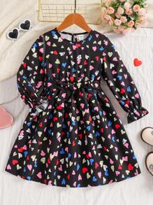 Vestido casual y lindo con estampado de corazones, cuello redondo y mangas campana para niña, otoño