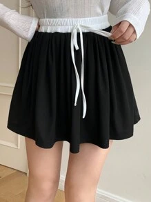 DAZY Quần short nam buộc dây phía trước màu trơn, váy thu - Đen và trắng - Xem 6