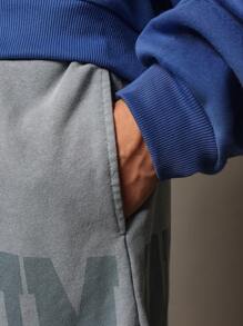 SUMWON Drop Crotch Washed Short With Letter Graphic Print