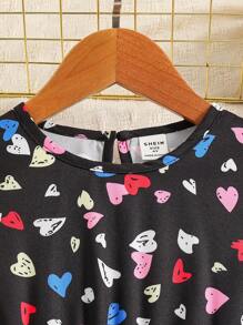 Vestido casual y lindo con estampado de corazones, cuello redondo y mangas campana para niña, otoño