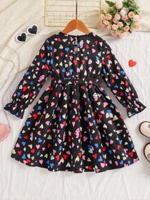 Vestido casual y lindo con estampado de corazones, cuello redondo y mangas campana para niña, otoño