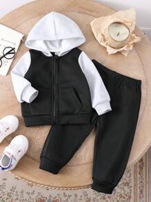 SHEIN This 2-Piece Set Includes A Hooded Zip-Up Sweatshirt Jacket And Solid Color, Adjustable Waist Pants, Providing Warmth And Comfort For Baby Boys During The Spring And Autumn Seasons. The Set Is Suitable For Both Outdoor Wear And Indoor Wear, And Can Be Paired With Various Outfits For Different Occasions. This Versatile And Durable Set Allows Baby Boys To Stay Stylish And Comfortable Throughout The Transitional Seasons.