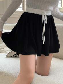 DAZY Quần short nam buộc dây phía trước màu trơn, váy thu - Đen và trắng - Xem 7