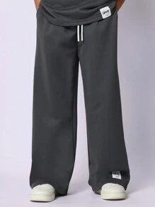 SUMWON Conjunto coordenado de camiseta oversized com ombros caídos e calça pantalona com cordão. Ideal para o inverno, estilo casual urbano e outono. - Cinza escuro - Ver 4