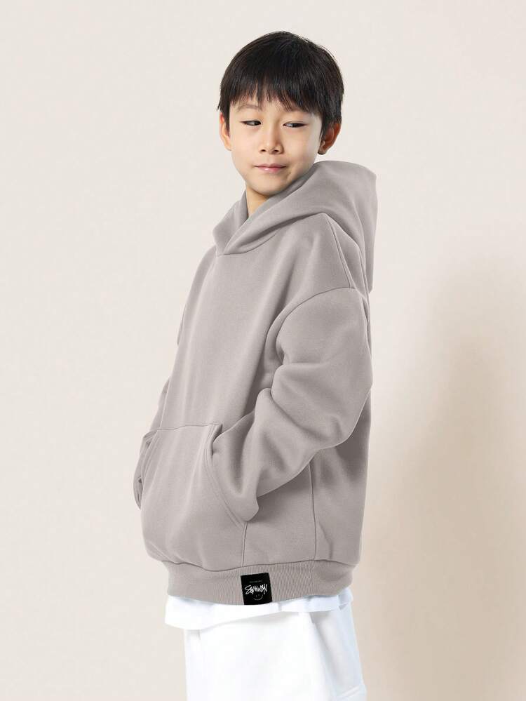 Moletom com capuz oversized e aconchegante com bolso central
