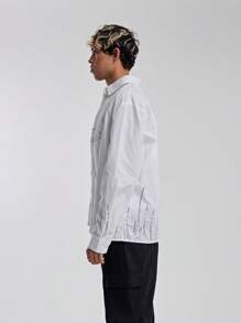 Musero Camisa con botones y logotipo en forma de llama para hombre