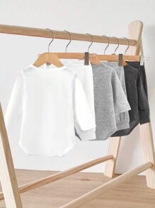 SHEIN Vintaside Kids Bộ áo liền thân 3 món này có thiết kế tinh tế và chất liệu cao cấp, được sản xuất đặc biệt để mang lại sự thoải mái và tiện lợi toàn diện cho trẻ sơ sinh và trẻ nhỏ. Bộ sản phẩm bao gồm ba áo liền thân, mỗi áo có thiết kế và chi tiết khác nhau để phù hợp với nhu cầu mặc của bé trong các dịp khác nhau. - Nhiều màu - Xem 9