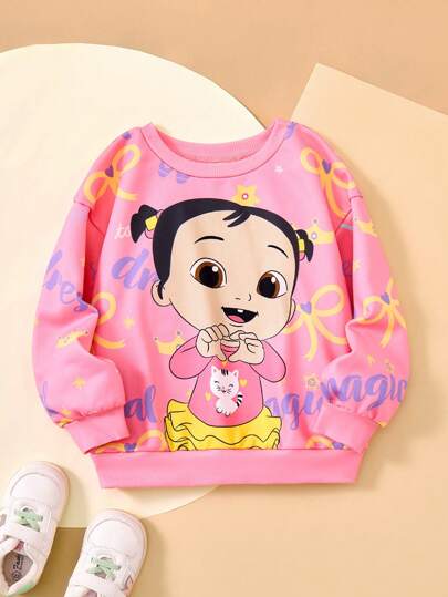 CoComelon X SHEIN Sweat-shirt à manches longues rose mignon et doux avec imprimé de fille de dessin animé jeune fille et nœud jaune