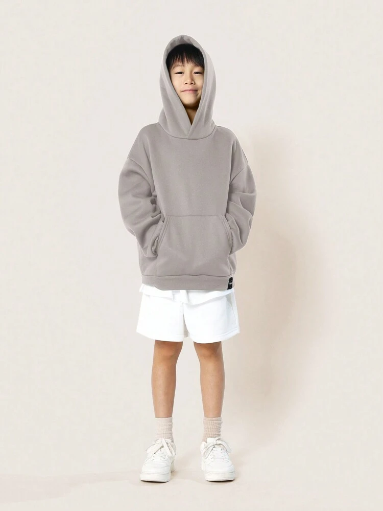 Moletom com capuz oversized e aconchegante com bolso central