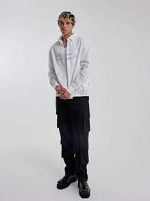 Musero Camisa con botones y logotipo en forma de llama para hombre