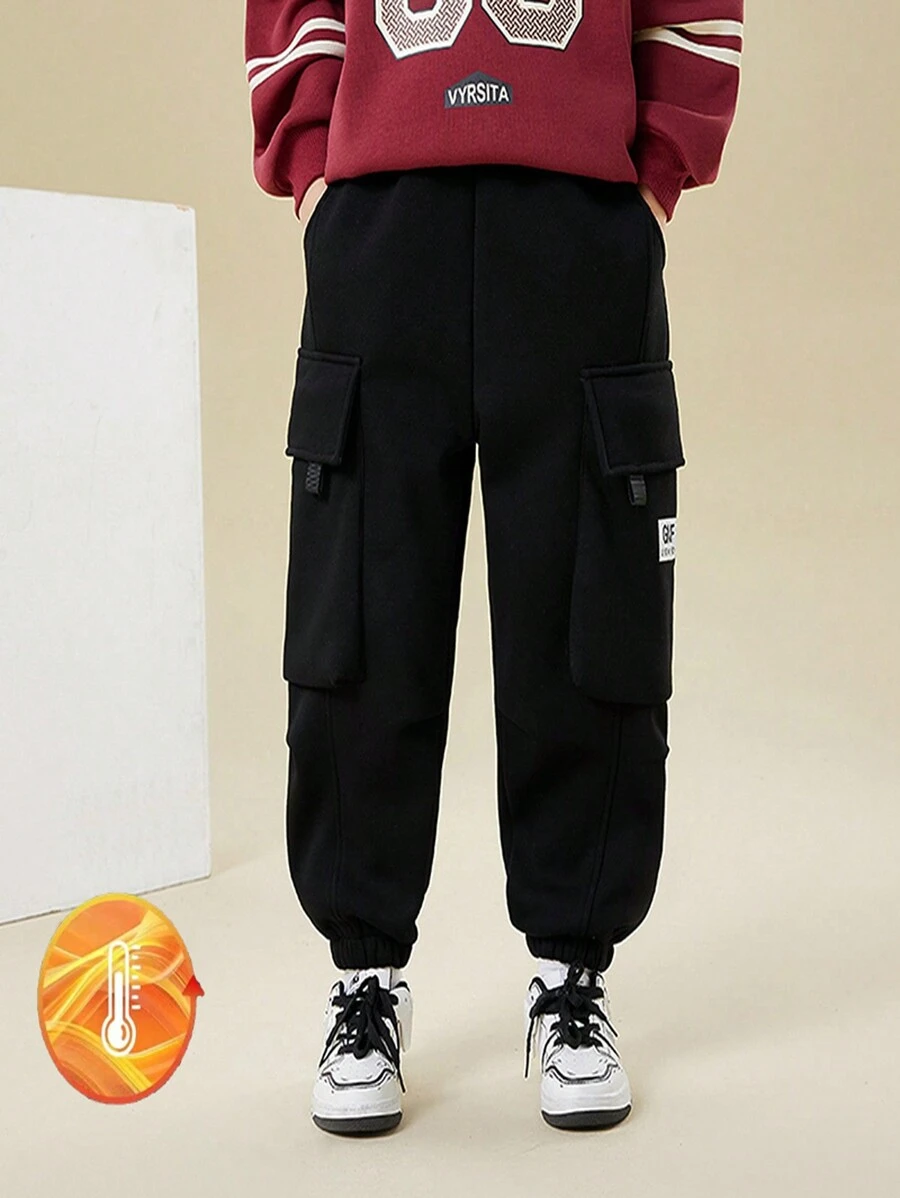 Pantalón casual de uso diario para niño preadolescente, de unicolor con detalle de parche de bolsillo - Negro - Ver 1