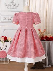 SHEIN Young Girl Christmas Elegant Flared Dress With Red & White Fabric, Short Puff Sleeves, Braided Trim, Front Metallic Buttons, Contrast White Hem Panels, Round Bag Attached