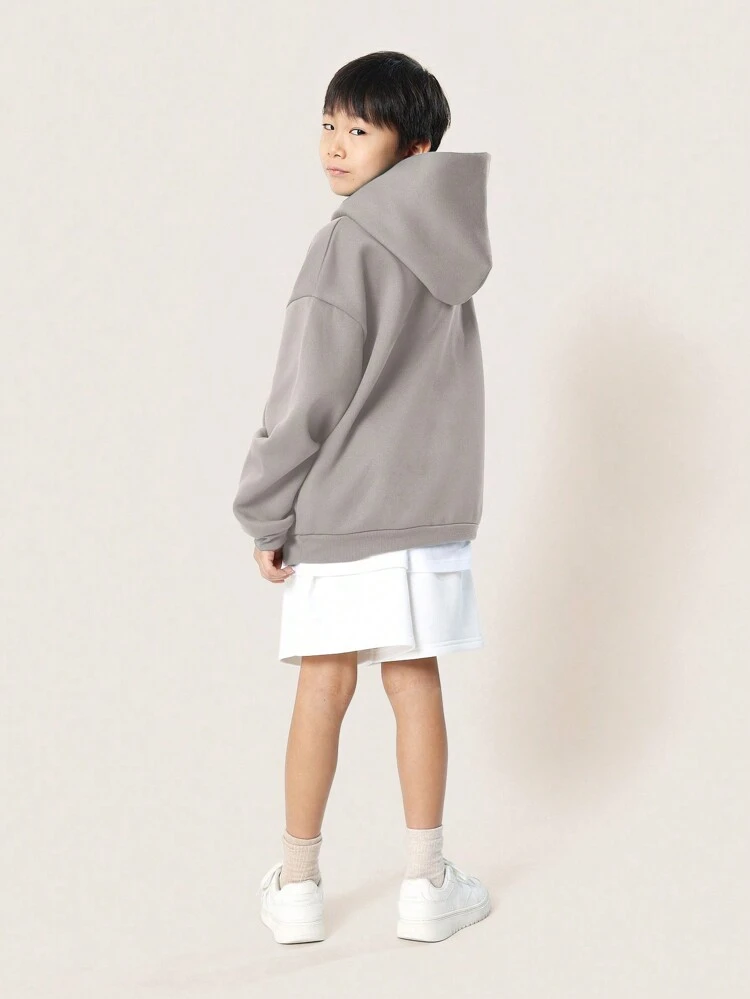 Moletom com capuz oversized e aconchegante com bolso central