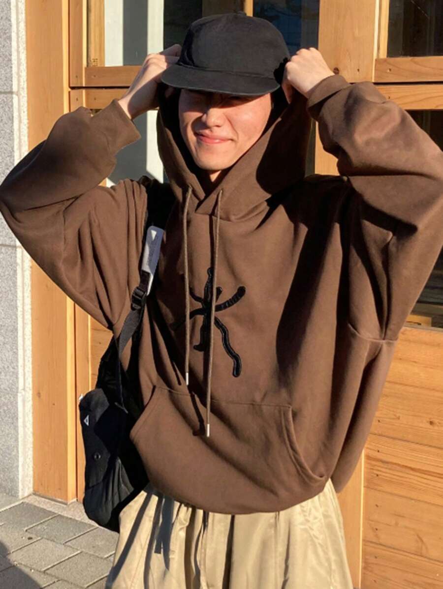 DAZY Áo hoodie nam dáng rộng, vai rớt, có túi kangaroo, dây rút, thích hợp cho kỳ nghỉ, thêu họa tiết. - màu nâu - Xem 1