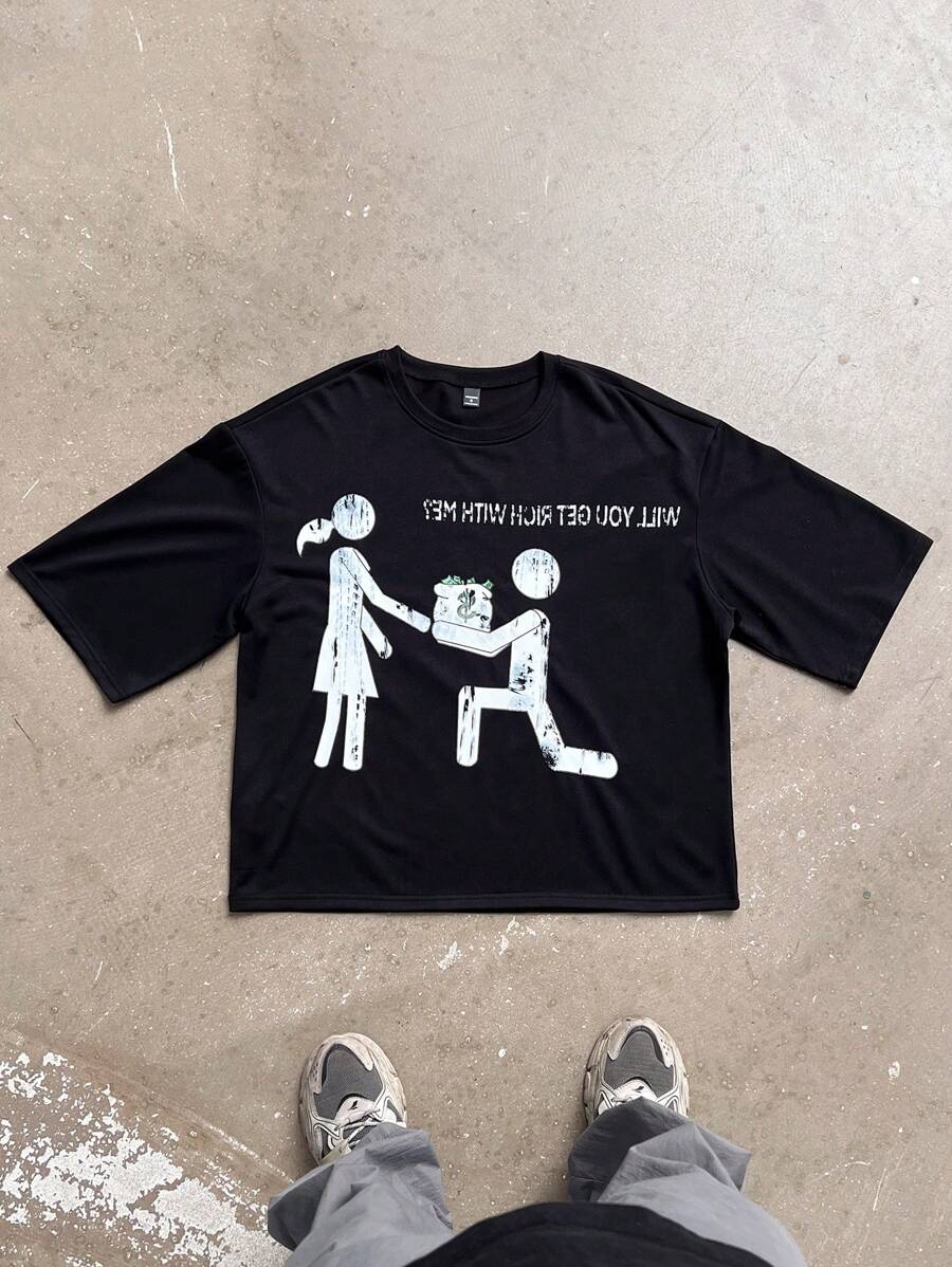 Manfinity EMRG Męska czarna koszulka z krótkim rękawem Fun Graphic Oversized Boxy Fit, prezenty dla chłopaka, odzież uliczna, prezent dla chłopaka - Czarne - Zobacz 1