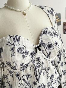 Soleia 大码女式花卉不对称下摆长袖休闲 T 恤，冬季假期系列 - 黑與白 - 查看 5