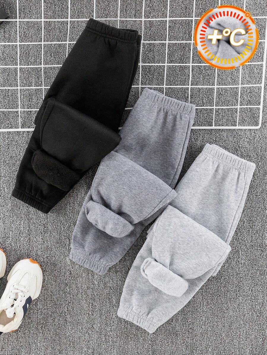 SHEIN Leap Crew Bộ 3 quần dài ống rộng thoải mái màu trơn cạp trung có dây rút cho bé trai, mua 2 tặng 1, thích hợp cho du lịch, đi học, tụ họp hàng ngày, mùa thu/đông, tựu trường, mùa thu, dáng rộng, quần áo trẻ em bé trai, bộ, áo nỉ cổ tròn - Nhiều màu - Xem 1