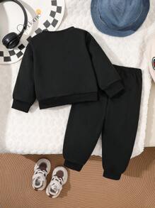 Bộ 2 món/Bộ áo nỉ đen thường ngày cho bé trai có túi in họa tiết và quần dài - màu đen - Xem 2