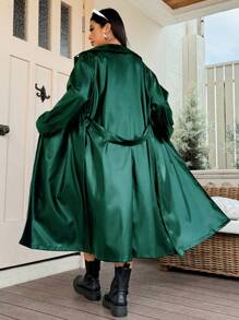 Flirla Plus Size Women Fashion Street Style Solid Color PU Leather Lapel Collar Slanted Pockets Belted Long Trench Coat