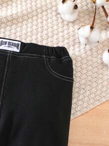 SHEIN 1 quần dài lưng thun co giãn mềm mại phong cách Hàn Quốc cho bé trai/bé gái thường ngày, thích hợp mặc hàng ngày, đi học, đi chơi, thể thao, mùa thu/đông - màu đen - Xem 5