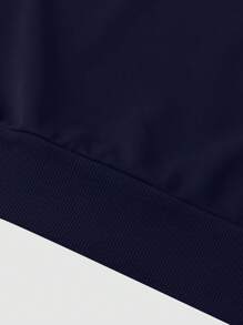 Manfinity LEGND Conjunto de sudadera de manga larga con cuello redondo y bicolor y pantalón de chándal liso con cordón para hombres talla grande
