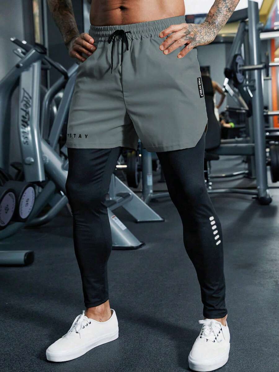 Manfinity Sport Streetwear Pantalones deportivos con cintura ajustable y estampado de letras para hombre, de 2 en 1