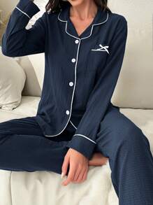 纯色口袋蝴蝶结装饰长袖上衣和裤子睡衣套装，舒适优雅细节，秋冬服装