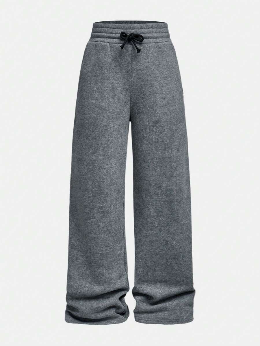 Pantaloni della tuta neri svasati con stampa floccata per ragazze adolescenti, vestibilità morbida, stile athleisure, gamba dritta con laccetto, perfetti per la casa e il tempo libero