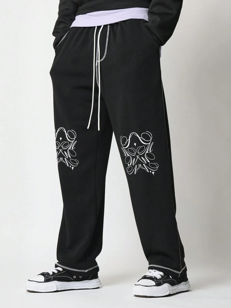 Pantaloni della tuta alti da jogging con stampa calligrafica