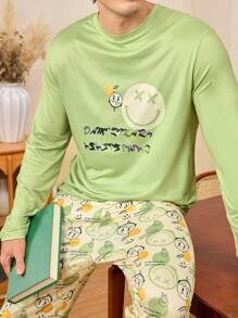 Conjunto de pijama para hombre con top de cuello redondo de manga larga con estampado de cara sonriente y letras, y pantalones