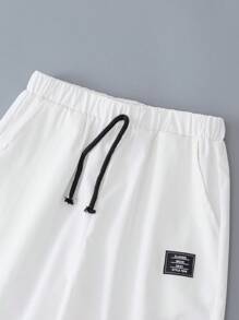 SHEIN Leap Crew 3pcs/Set Tween Boy Loose Casual Woven Solid Color Drawstring Jogger Pants Set - Black - View 3