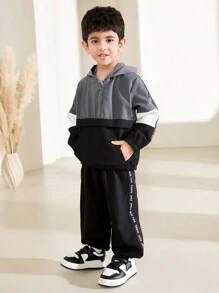 Set de 2 piezas chaqueta con capucha y pantalones de niño joven con contraste de color y cinta, atuendo casual de otoño