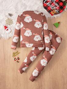 Set de 2 piezas de pijama de ajuste ceñido con estampado de Papá Noel de manga larga para niño pequeño