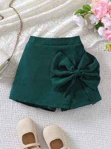 SHEIN 年轻女孩纯色蝴蝶结装饰开衩下摆休闲短裙 - 墨綠色 - 查看 1