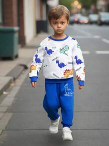 Set de 2 piezas con sudadera y pantalón jogger con estampado de dinosaurios de dibujos animados en estilo universitario casual para niño, cómodo y versátil para uso diario
