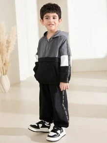 Set de 2 piezas chaqueta con capucha y pantalones de niño joven con contraste de color y cinta, atuendo casual de otoño