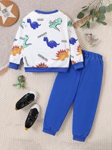Set de 2 piezas con sudadera y pantalón jogger con estampado de dinosaurios de dibujos animados en estilo universitario casual para niño, cómodo y versátil para uso diario