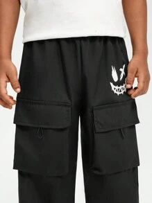 SHEIN Young Boys Casual Cargo Pants With Smiling Face Print & Large Pockets Design, Comfortable Fabric, Relaxed Fit, Suitable For 4-7 Years Old Boys, For Spring, Autumn, Daily, School, Party, Entertainment - Black - View 5