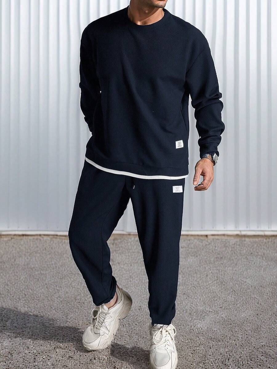 Manfinity Homme Áo nỉ dài tay in chữ và quần nỉ họa tiết tổ ong cho nam, bộ đồ thường ngày, mùa thu - Màu xanh hải quân - Xem 1