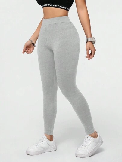 SHEIN Essnce Leggings deportivos informales de unicolor, pantalones versátiles y largos para mujer que se pueden usar en primavera y otoño