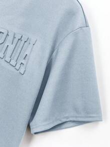 SHEIN Parte superior casual de manga corta y hombros caídos para adolescentes varones, con gráfico en inglés con relieve 3D
