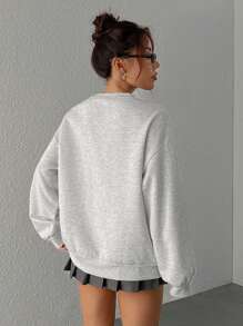 SHEIN EZwear Sudadera casual de mujer con cuello en V de un solo color y estampado numérico, para uso diario