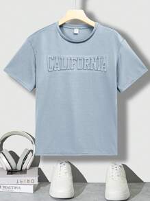 SHEIN Parte superior casual de manga corta y hombros caídos para adolescentes varones, con gráfico en inglés con relieve 3D