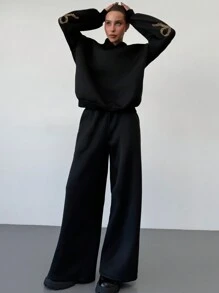 Aloruh 女士秋冬新款时尚休闲日常装蝴蝶结印花纯色黑色宽松大码连帽衫运动衫